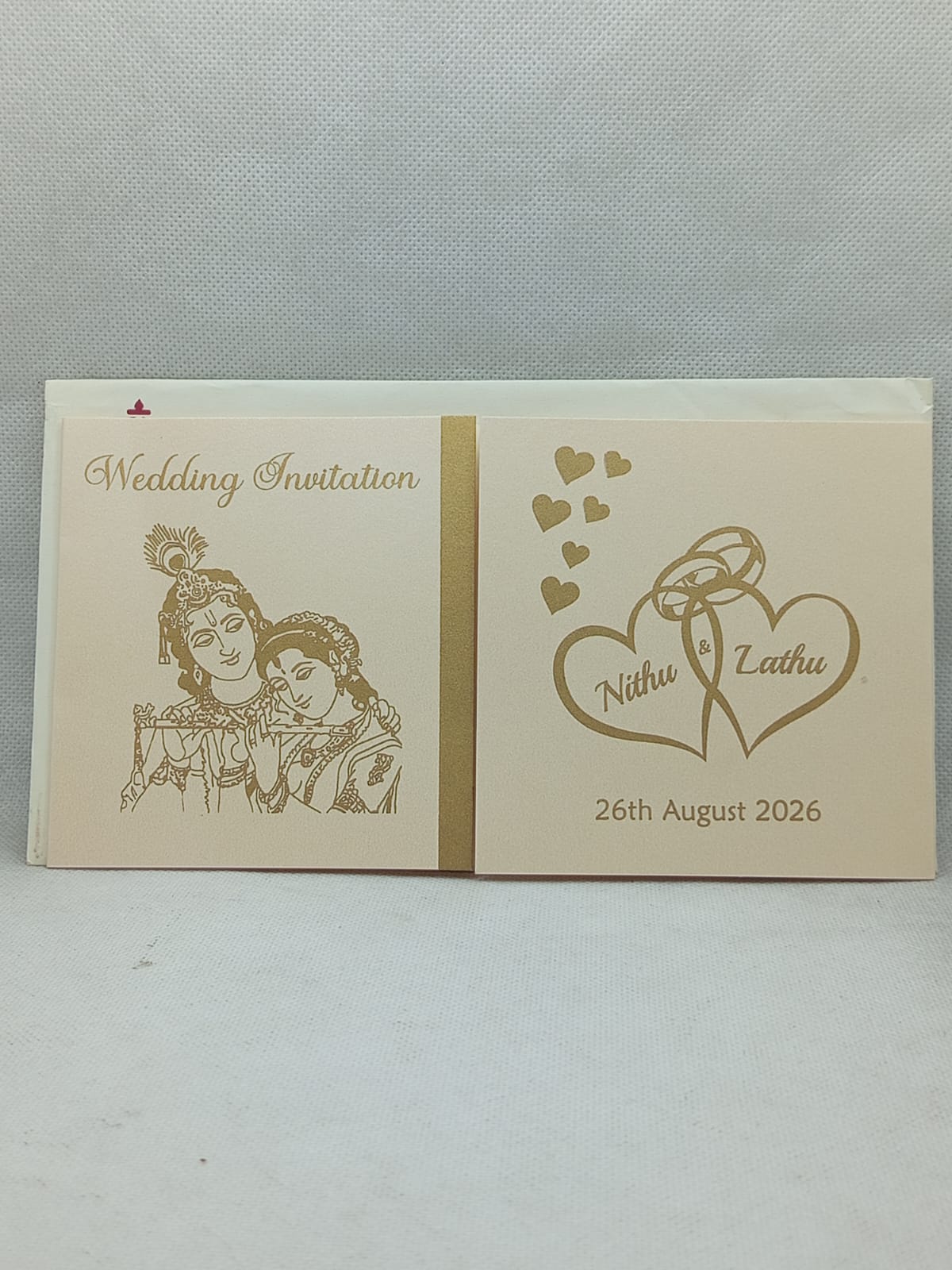 WhatsApp Image 2026-09-29 at 3.37.55 PM Door open small cream colour wedding card - Image 1